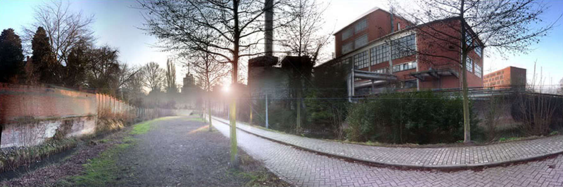 Links in beeld de Vunt, rechts de Dijle verscholen achter het groen in het centrum van Leuven
